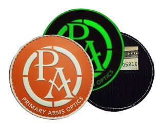 Primary Arms Optics Orange Round Glow in the Dark Rubber Morale Patch with velcro back and hidden pouch